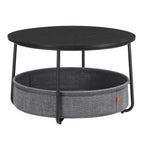 Modern round coffee table with fabric storage basket and metal frame