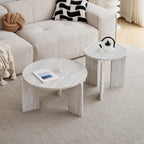 Set of 2 white imitation travertine coffee tables with three-legged design