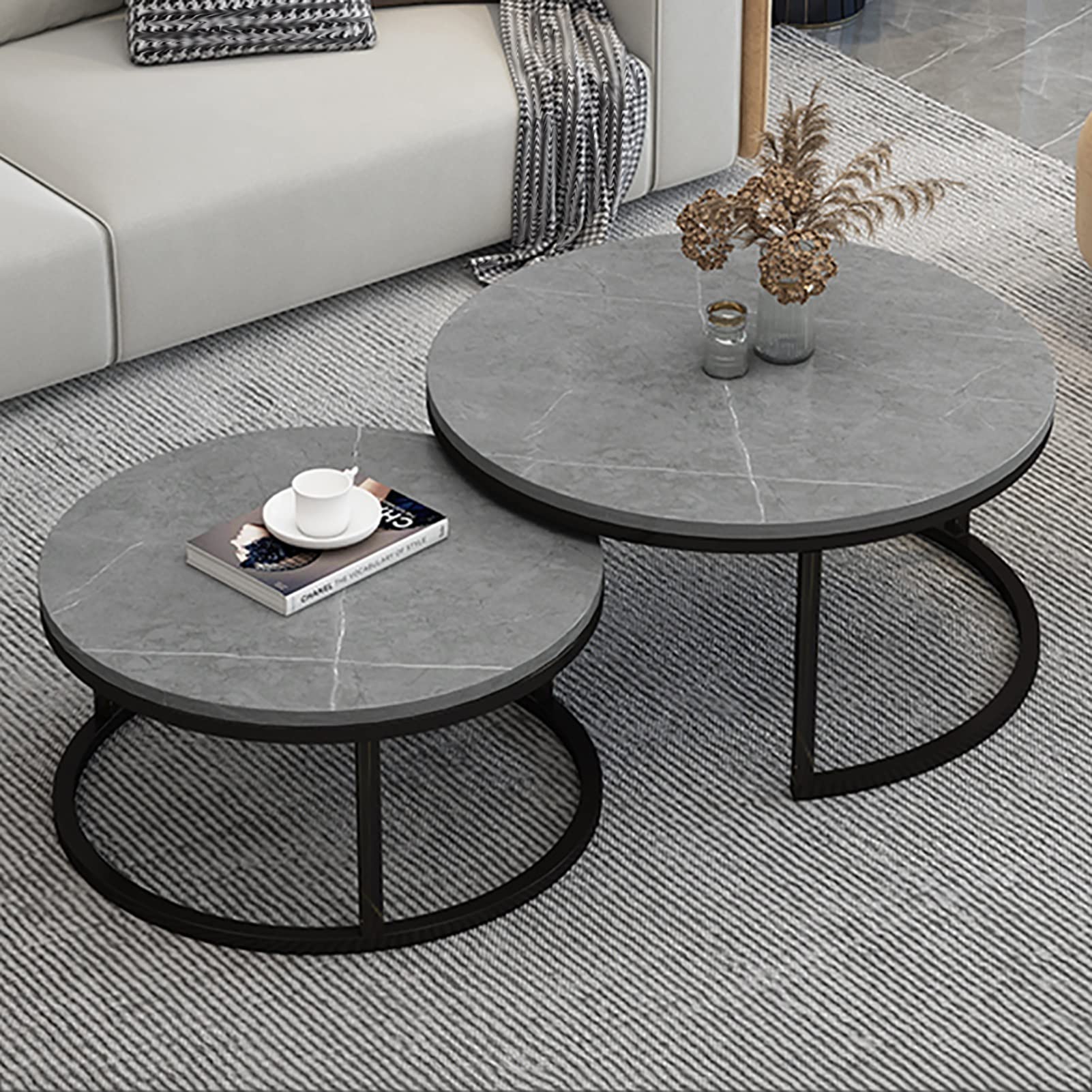 Modern nesting coffee table set with marble top on a living room