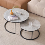 2-piece round coffee table set with grey marble top and black metal frame