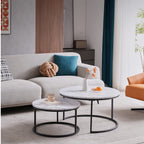 HJhomeheart nesting coffee tables set with round white tops and black metal legs