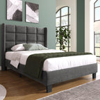Merax grey upholstered bed with a high headboard and black legs, featuring a slatted base
